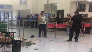 Walmart Woman defies authority, gets blasted with the taser